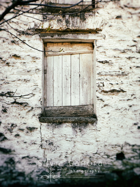 Window blocked by white boards in an old stone house- ©Silvia Ganora Photography - All Rights Reserved